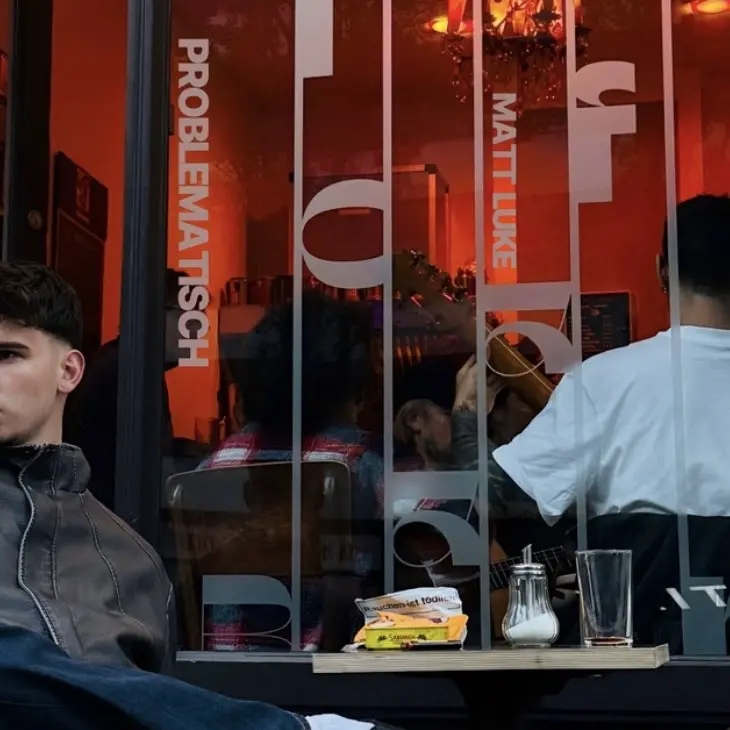 Author sitting at a table