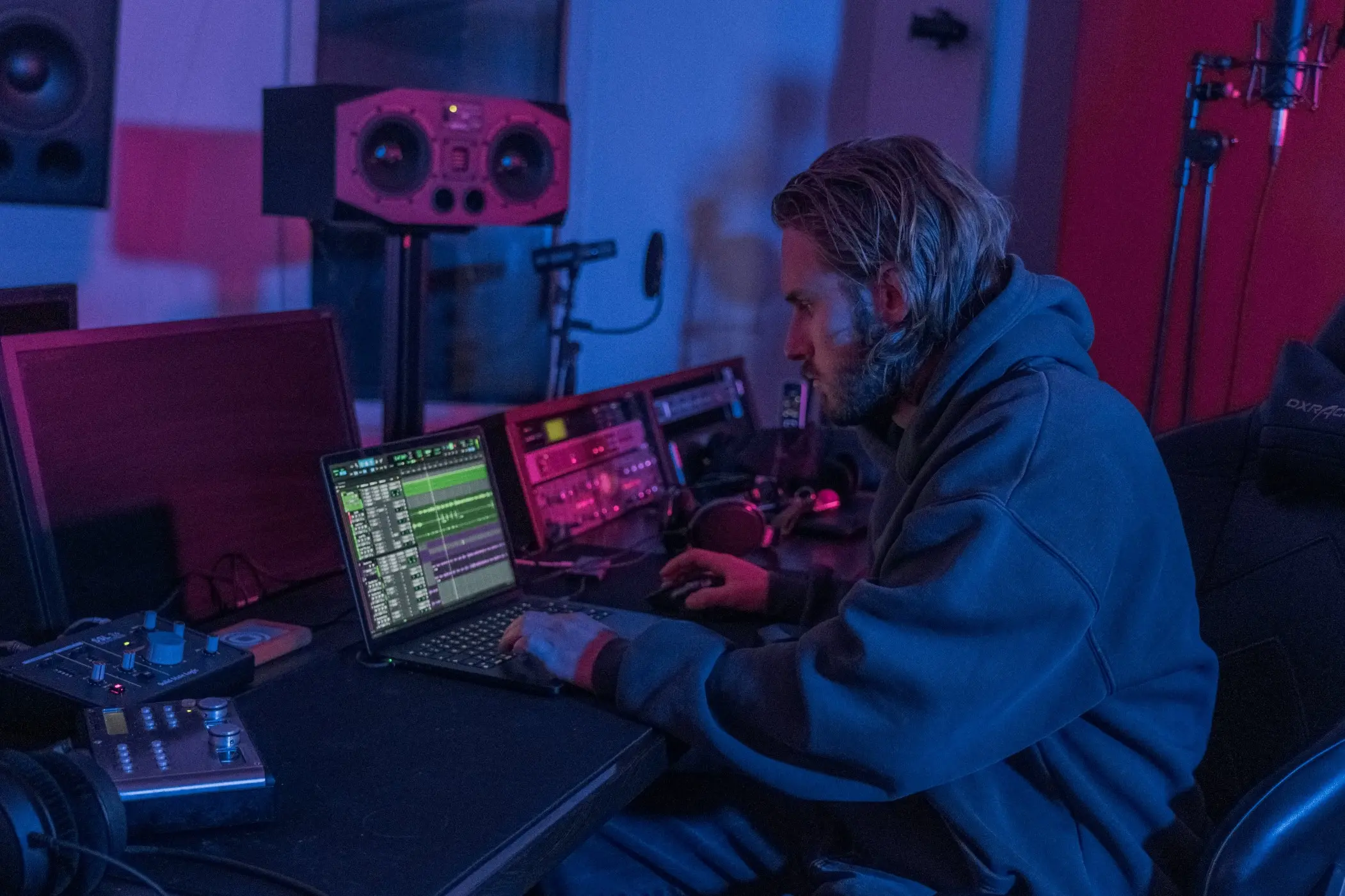 Studio Photo from the back in the center is yaro and on the left is one of his clients